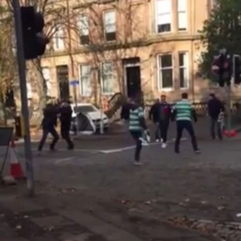 Violent-brawl-breaks-out-between-Rangers-and-Celtic-fans-on-their-way-to-Hampden